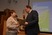 Генеральный директор вручает награду экологу Георгиевского ЛПУ МГ Светлане Климовой