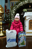 Юный участник благотворительной акции в храме Рождества Пресвятой Богородицы в станице Рождественской Ставропольского края